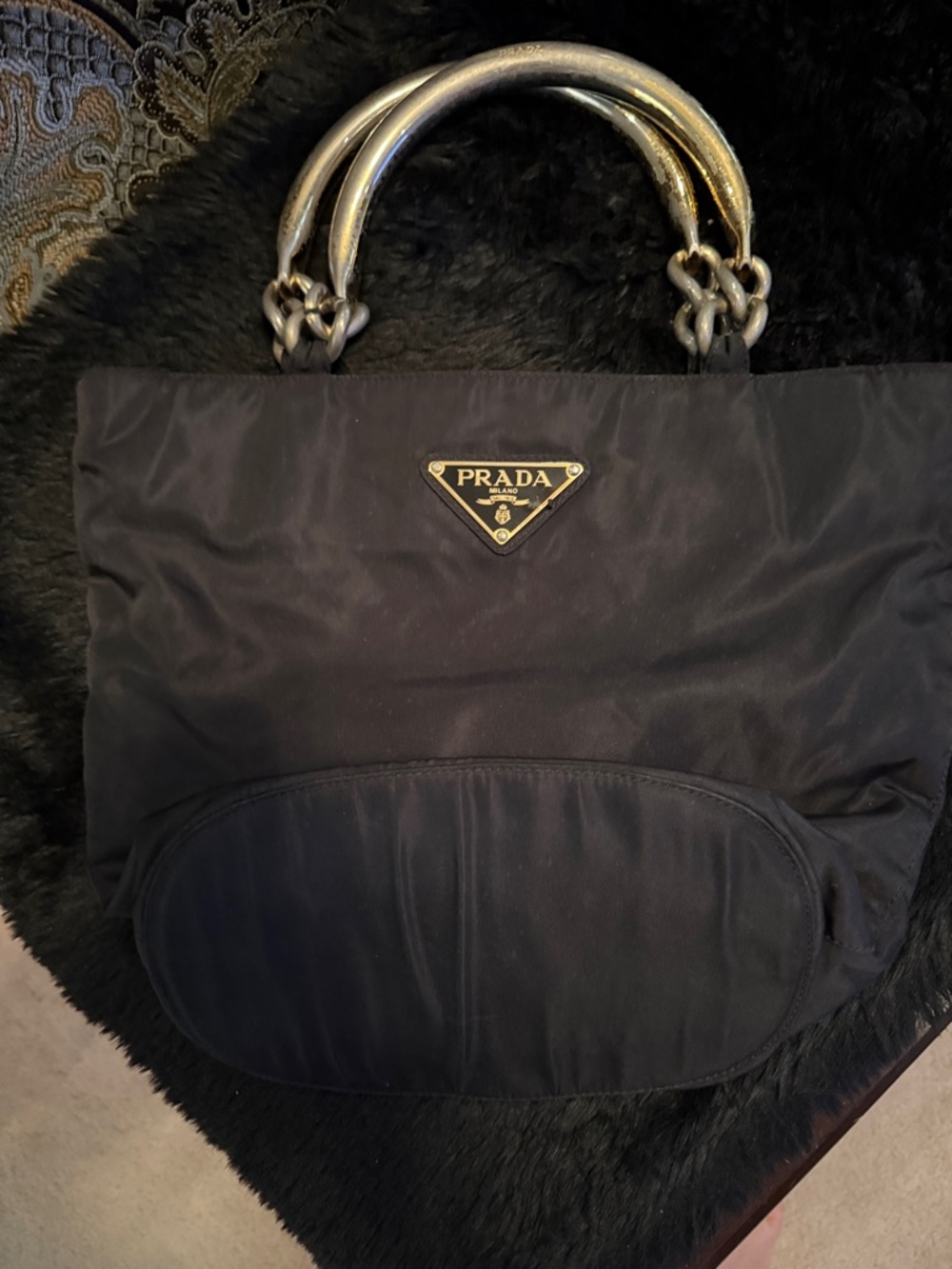 Authentic Prada Black Nylon satchel with Gold-Tone arched  Handles .